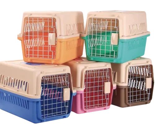 Portable pet carrier by isemipet Multiple plastic pet carriers in blue, pink, orange, green, etc.