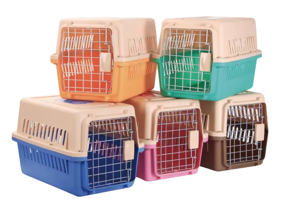 Portable pet carrier by isemipet Multiple plastic pet carriers in blue, pink, orange, green, etc.