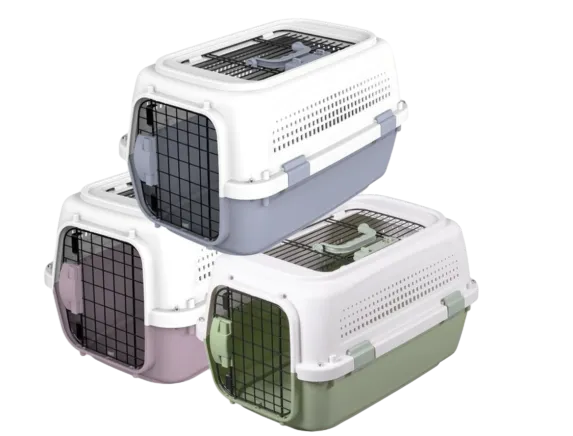 Stack of three hard-shell pet carriers in multiple colors