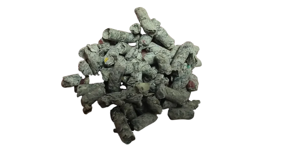 Cluster of recycled newspaper cat litter pellets
