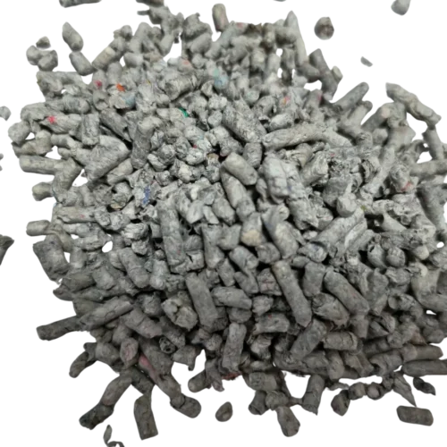 Macro shot of recycled newspaper cat litter pellets